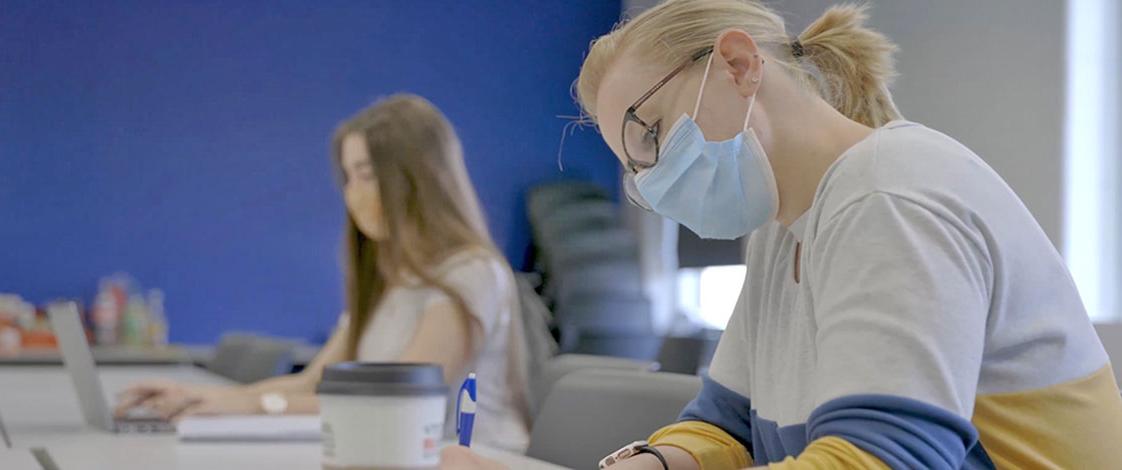 students taking notes in class